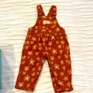 Wild Wawa orange and cream colored corduroy floral overalls